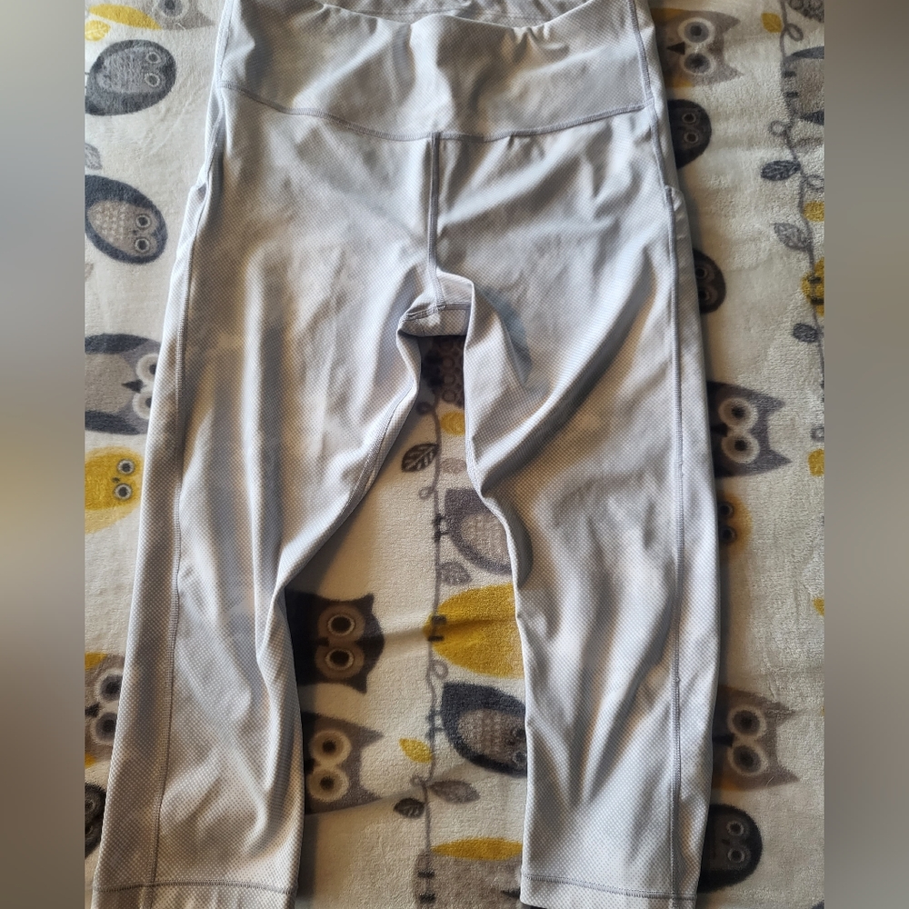 4 pairs of Athleta leggins.